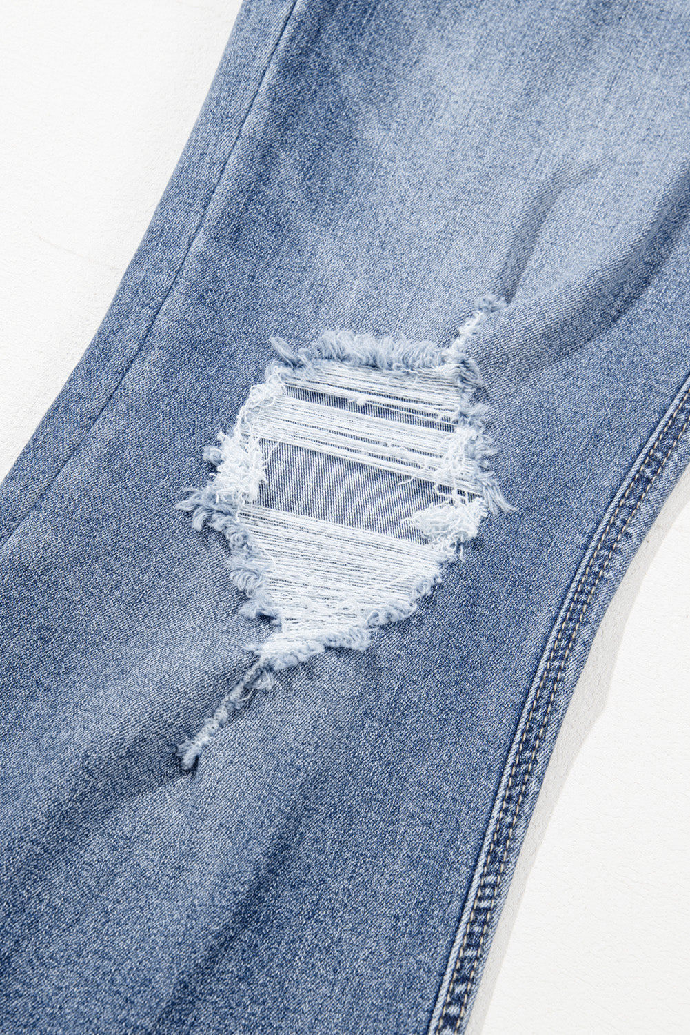Laylani Distressed Hem Flared Jeans